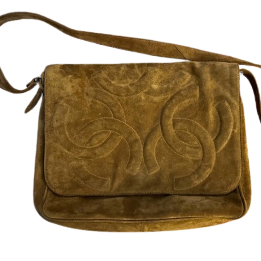 Chanel suede crossbody messenger bag with tassel. Preloved good condition.